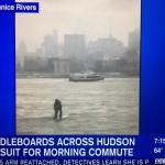 Watch: Man Commutes to Work by Paddle Boarding Across Hudson River in a Suit